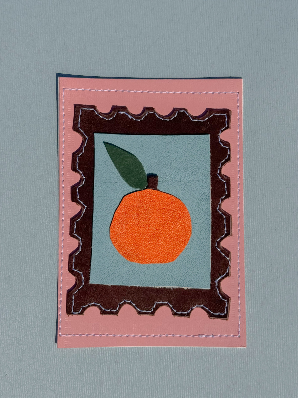 L'orange - Médaillon + Carte postale